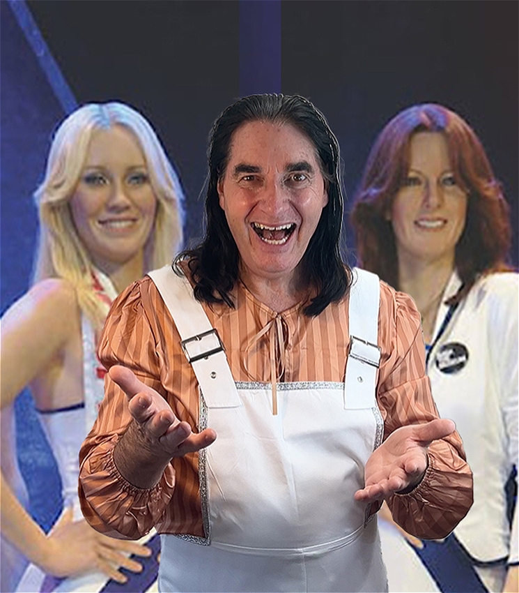 Dr H standing in front of the band ABBA.