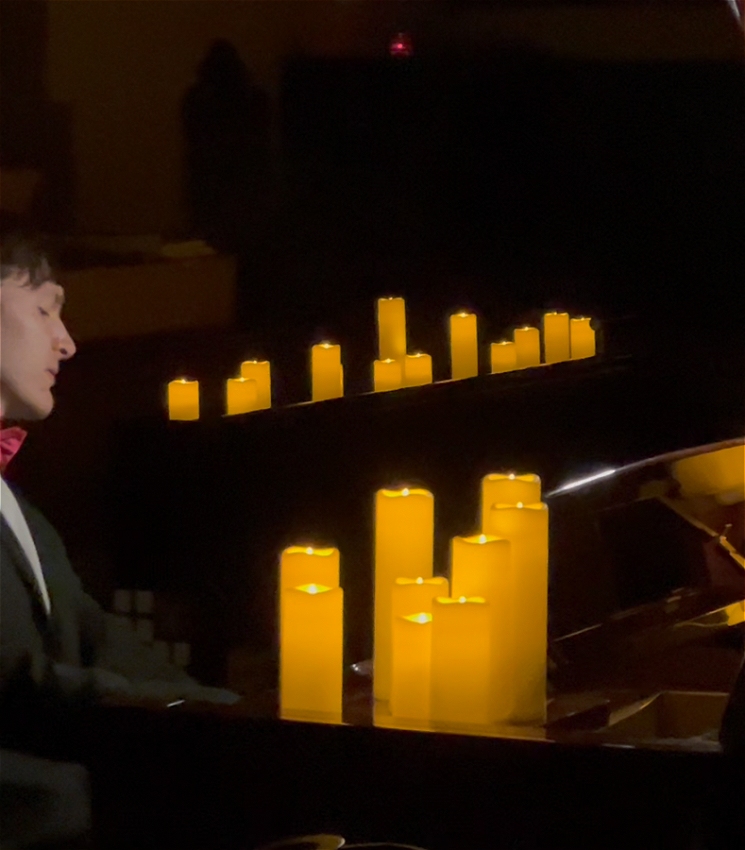 Matthew Shiel plays piano by candlelight