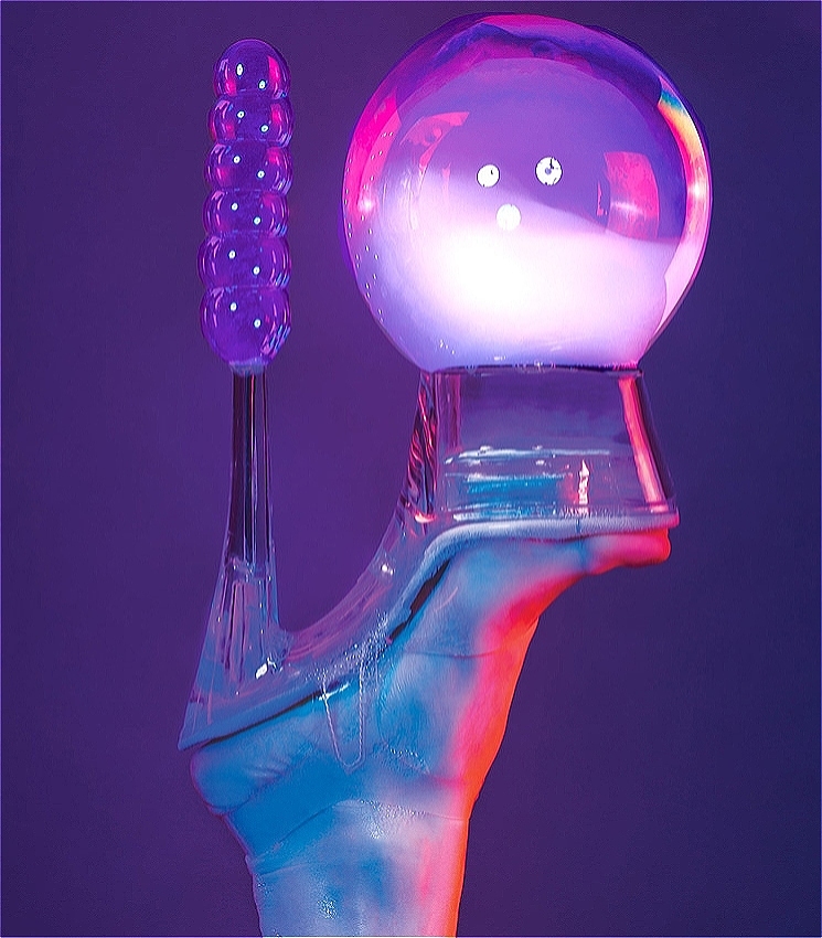 High heel shoe with a bubble half filled with smoke on the front and a small tower of bubbles on the heel